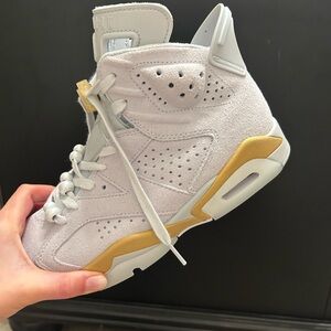 Jordan Women's White and Gold Sneakers